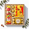 Geschenkbox Goldener Genuss mit Ferrero Rocher, Toblerone Pralinés, Heindl Schoko Fouree und Früchte Dragees, Ansicht von oben