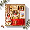 Geschenkbox Mozart Festspiele mit Reber Mozartkugeln in Geigen-Verpackung, Mozart-Chocolade und Mirabell, Ansicht von oben