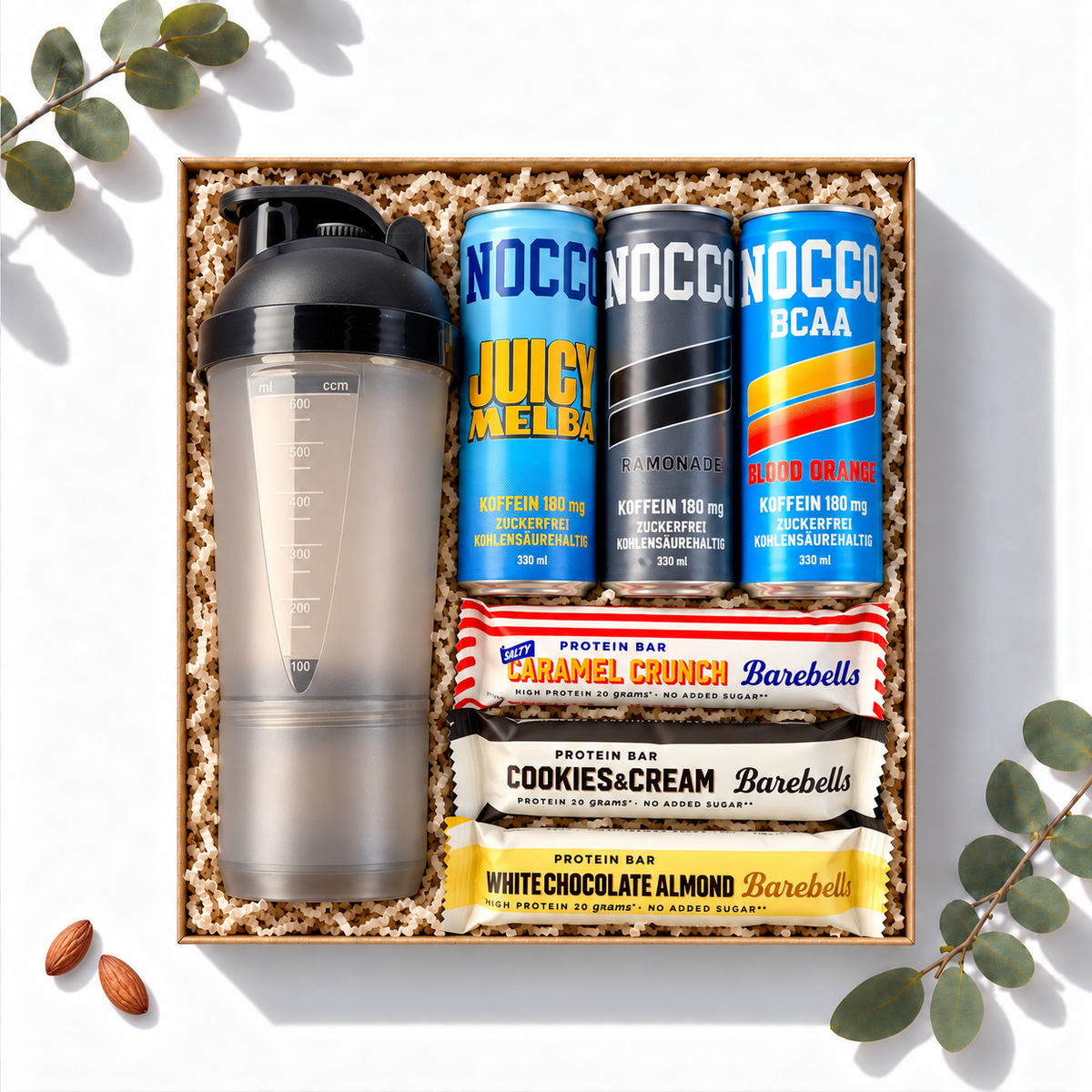 Geschenkbox Workout Booster mit Nocco Sportdrinks, Barebells Proteinriegeln und Protein-Shaker, Fitness-Geschenk von oben